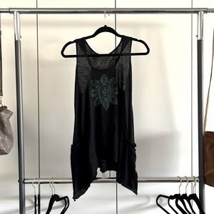 Black and blue tank top flower logo